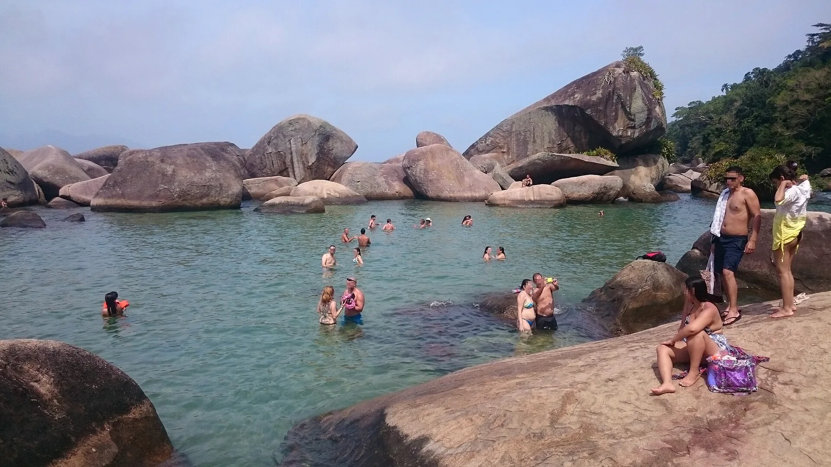 The Cachadaço natural pool ringed by boulders at Trindade